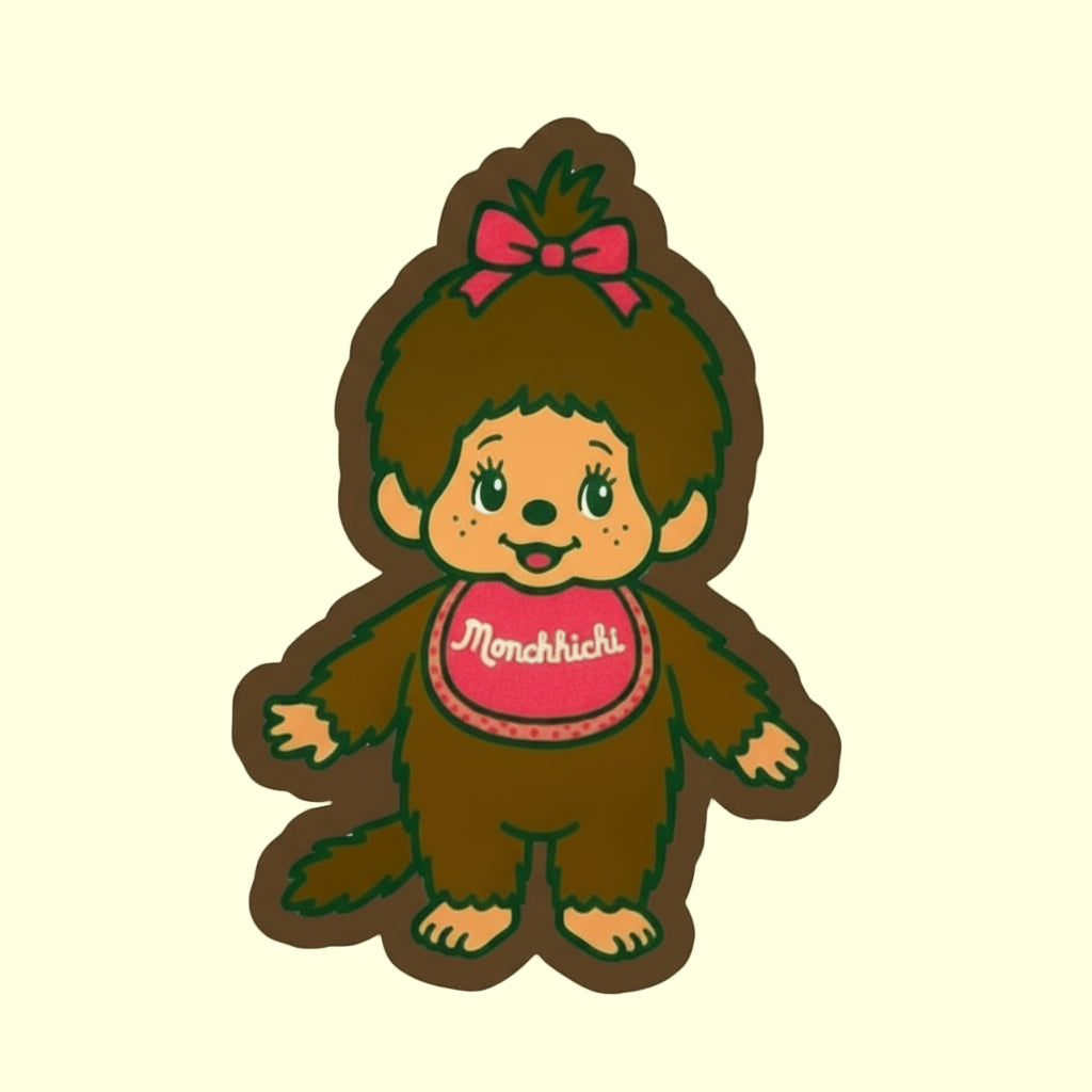 Stylized monchhichi sticker with a pink bow and heart-shaped logo on a black background