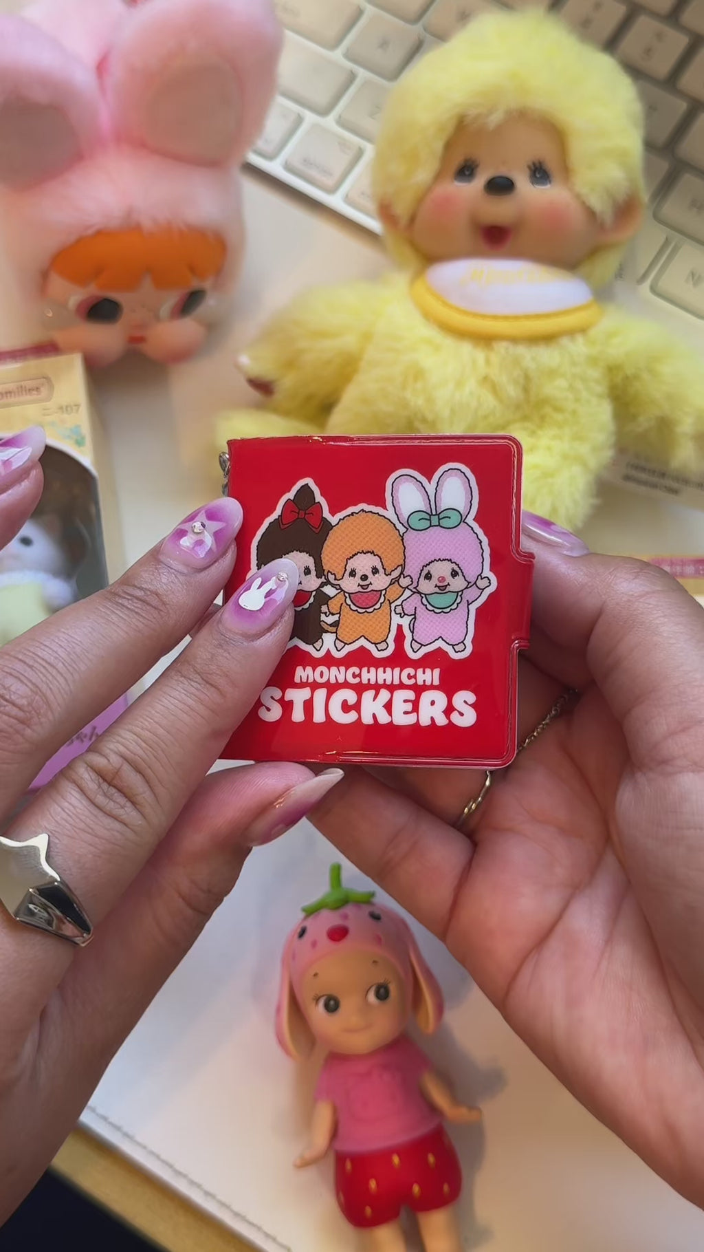 monchhichi pip sticks sticker book paging through